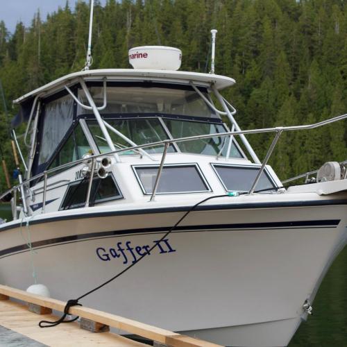 tidal charters vessel for port hardy and river's inlet fishing tours British Columbia West Coast background